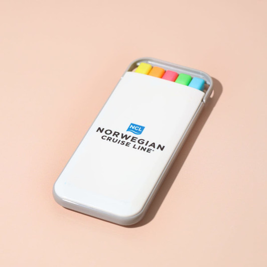 A highlighter set in a white case featuring yellow, orange, pink, and green highlighters, with a logo on the case.