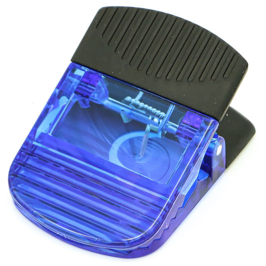 A wide magnetic croc clip in blue and black, featuring a textured grip and a transparent section.