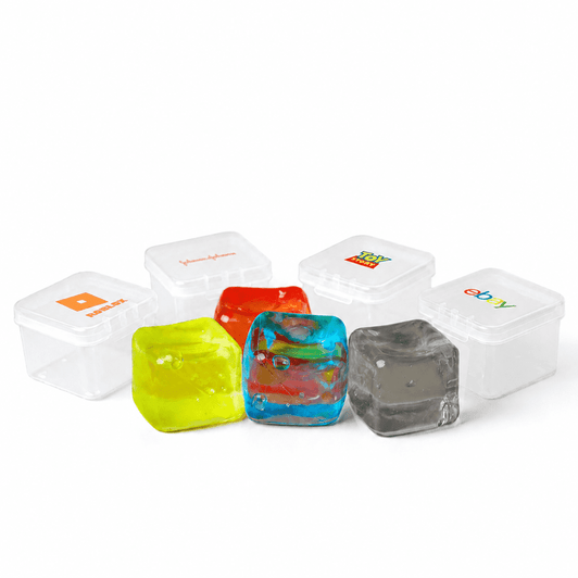 A set of colourful jelly cube sensory toys in red, yellow, blue, and grey, with clear plastic containers and logos.