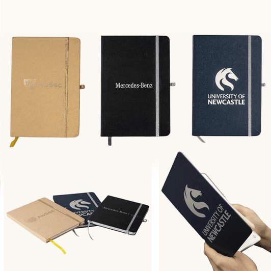 Three A5 notebooks in various colours: brown, black, and dark blue, each featuring a logo.