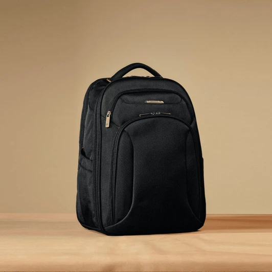 A black Samsonite Xenon 3.0 backpack with multiple compartments and a carrying handle. It features a logo.