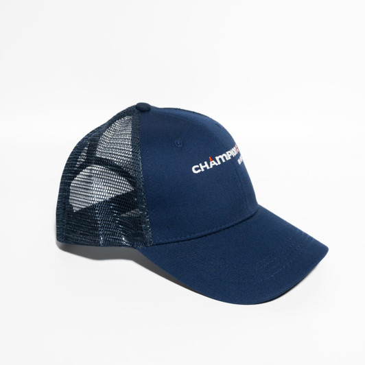 A navy blue snapback trucker cap with a mesh back and a logo on the front.