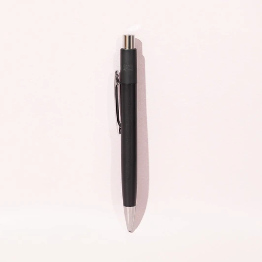 A metal ballpoint pen in black, featuring a clip and a silver tip, with a logo on the barrel.