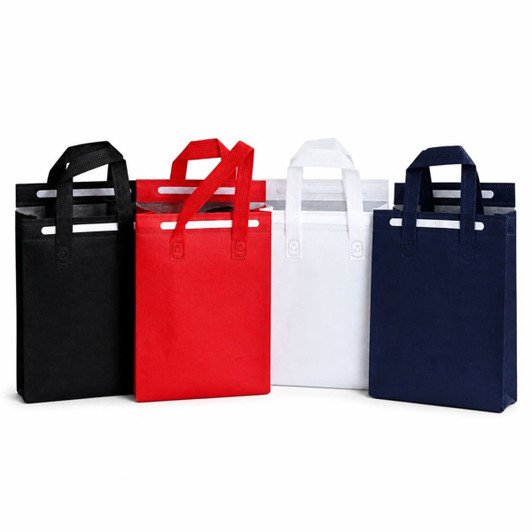 A set of four insulated reusable bags in black, red, white, and navy, each with two handles and a logo.