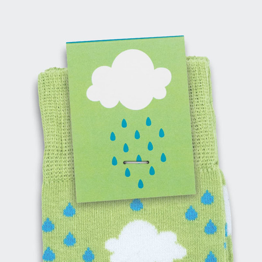 Green knitted business socks with a cloud and raindrop pattern, featuring a tag with a logo.