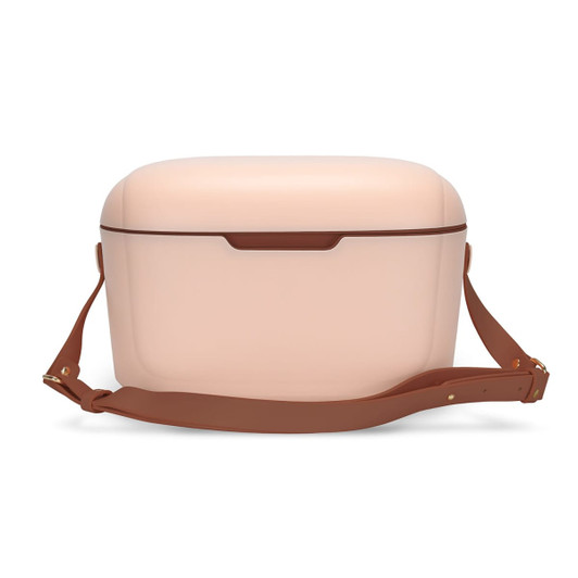 A drink cooler in a soft pink colour with a brown strap, featuring a smooth, rounded design.