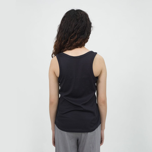 A women's sports tank top in black, featuring a simple sleeveless design and a smooth back.