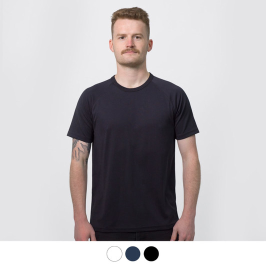 A man stands wearing a navy blue TRENDSWEAR Agility men's sports t-shirt. The shirt features a logo.