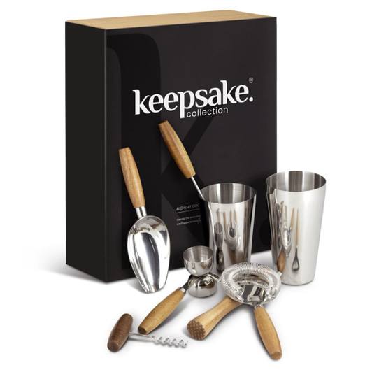 A cocktail set featuring stainless steel utensils and wooden accents, displayed in a sleek black box with a branding logo.
