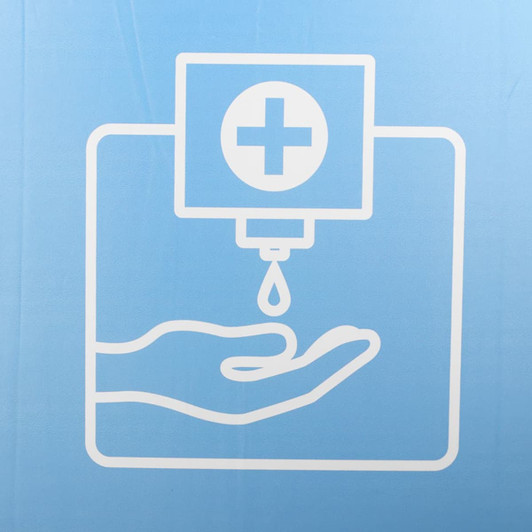 A graphic of a hand under a dispenser, with a droplet falling from a medical cross symbol. Predominantly blue background.