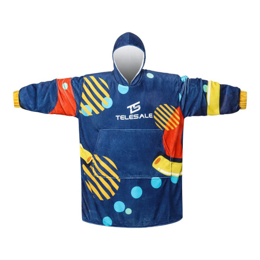 A blue wearable blanket with a colourful abstract design and a large front pocket. It features a hood and has a logo.