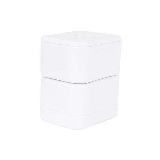 A white universal travel adapter kit featuring stacked compact sections, with a smooth finish and no visible branding.