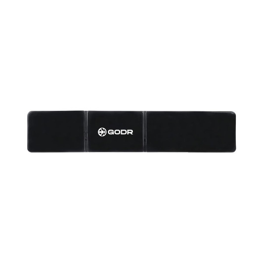 A black sticky nano rubber pad with a logo, designed for holding devices securely.
