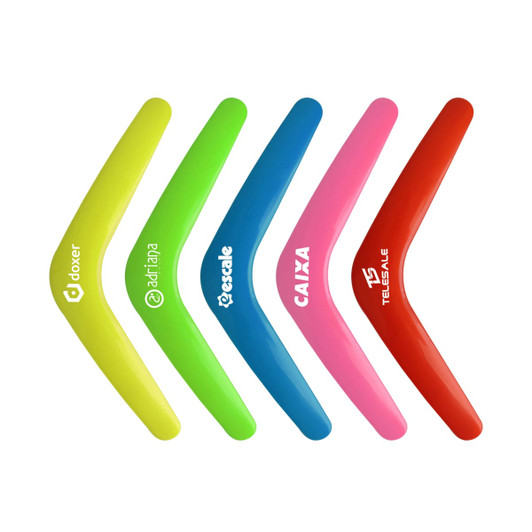 Five V-shaped boomerang toys in bright colours: yellow, green, pink, red, and orange, featuring various logos.