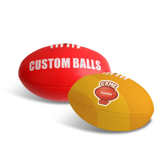 Two promotional AFL balls, one red with white lettering and one yellow with a logo, featuring classic stitching.