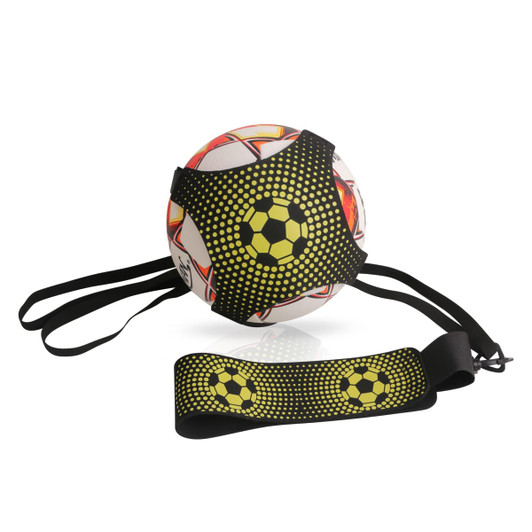 A soccer training belt in black with yellow design, paired with a soccer ball. Features an elastic strap for secure attachment.