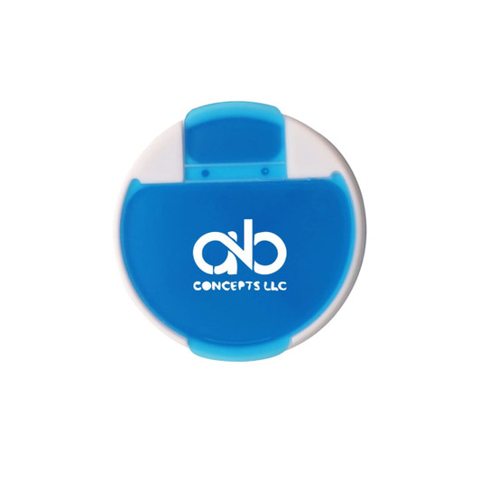 A round pill box in white and blue with a flip-top lid and a logo on the front.