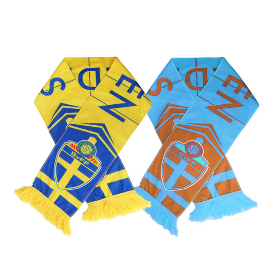 A fleece scarf in yellow and blue, alongside another in blue and orange, featuring branding and fringed ends.