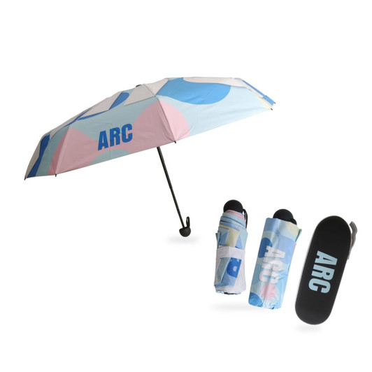 A mini folding umbrella in pastel colours, featuring a case with a logo. The umbrella is open, displaying its design.