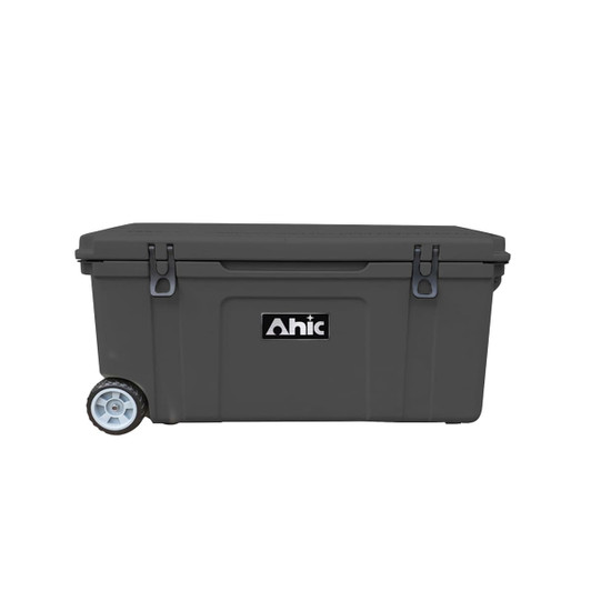A grey cooler box with wheels and a handle, featuring a logo on the front.