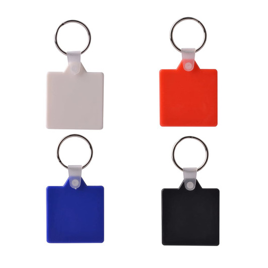 Square hard plastic keyrings in white, red, blue, and black, each with a metal keyring attachment.