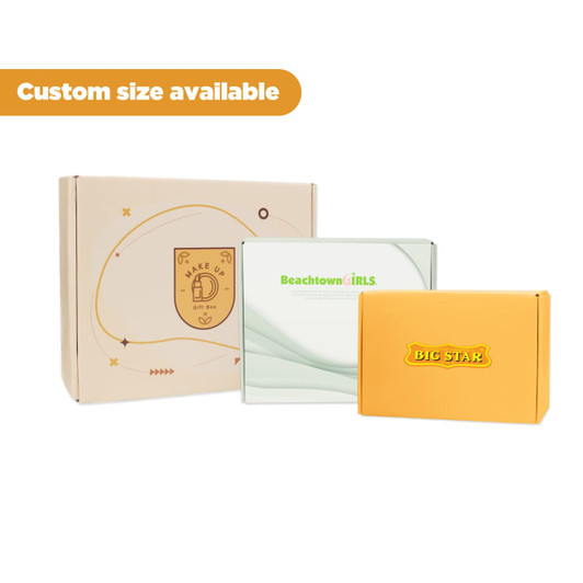 Three product boxes in various colours: a brown box with a logo, a clear box, and an orange box with branding.