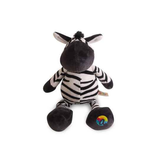 A plush zebra toy in black and white stripes with a soft, rounded body and a colourful logo on its foot.
