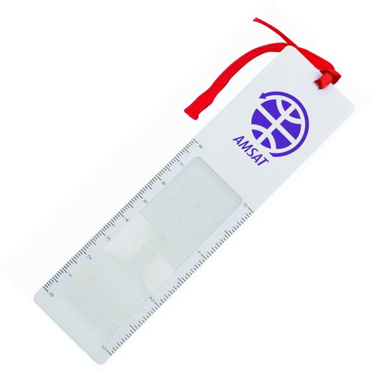 A clear magnifying bookmark ruler with a red ribbon and a logo on the top. Measures up to 15 cm.