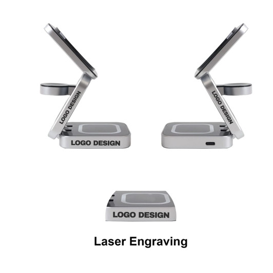 A foldable wireless charger stand in silver, featuring a sleek design and an engraved logo.