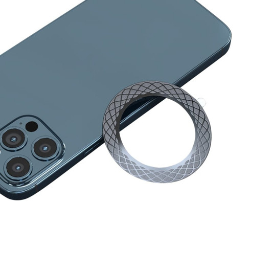 A silver magnetic ring next to a blue smartphone, showcasing a sleek, modern design.