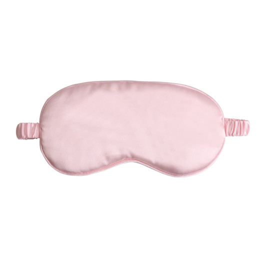 A satin sleep mask in soft pink, featuring an elastic strap for a secure fit. It has a smooth, soft surface.