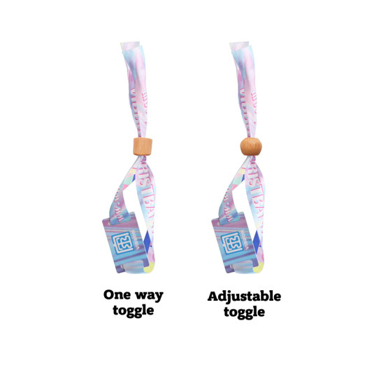 Two RPET fabric wristbands in pastel colours, featuring an adjustable toggle and a one-way toggle design. Each has a logo.
