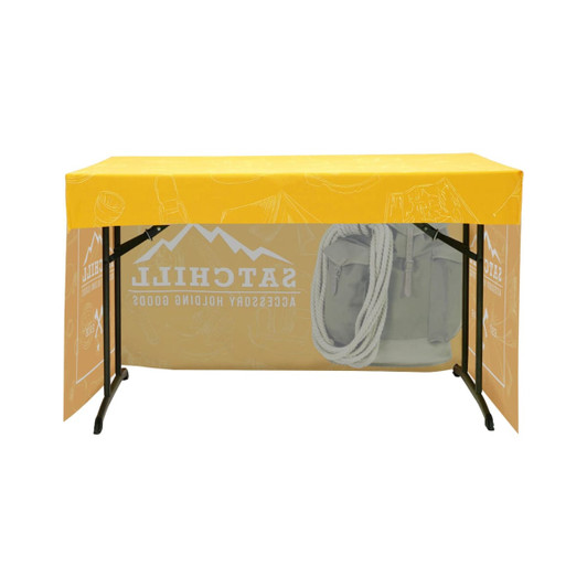 A yellow 3-side fitted table cloth for a 6ft table, featuring a design and a grey bag hanging on the side.