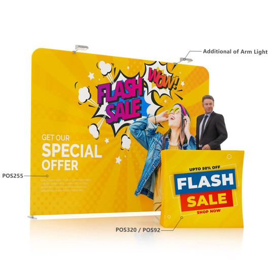 A promotional display wall featuring vibrant colours, with a graphic design and a person standing next to it.