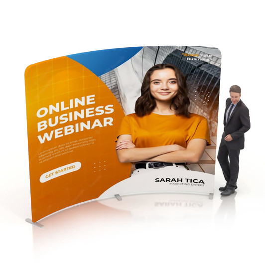 A curved tension fabric display wall featuring a model in an orange top, with a logo and promotional text on a bright backdrop.