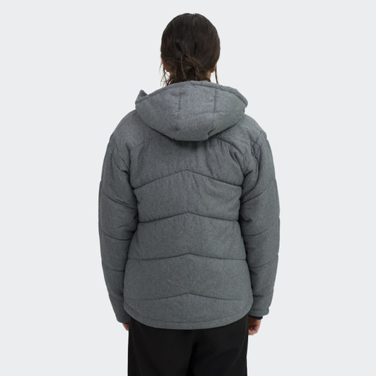 A women's puffer jacket in grey with a hood, featuring a chevron quilted design and a logo on the back.