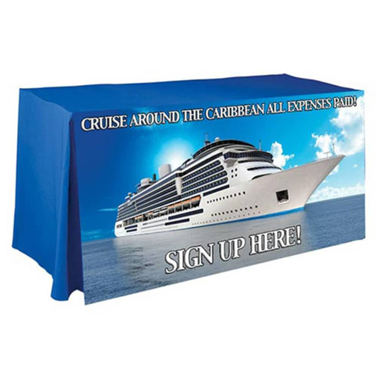 A blue, pleated tablecloth featuring an image of a cruise ship with a promotional message.