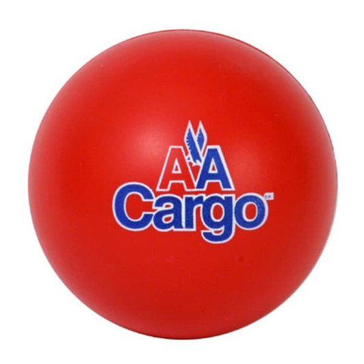 A red, round stress ball in the shape of a baseball, featuring a logo on the surface.