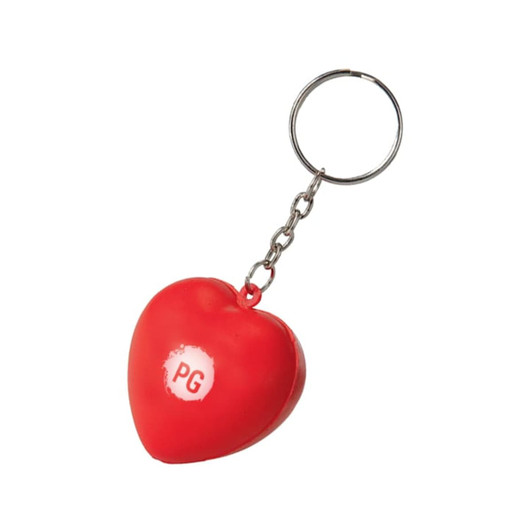 A red heart-shaped stress reliever attached to a silver keyring, featuring a small logo.