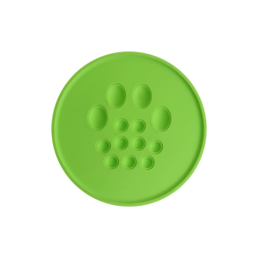 A round green fidget frisbee with textured bump patterns on the surface, featuring a logo in the centre.