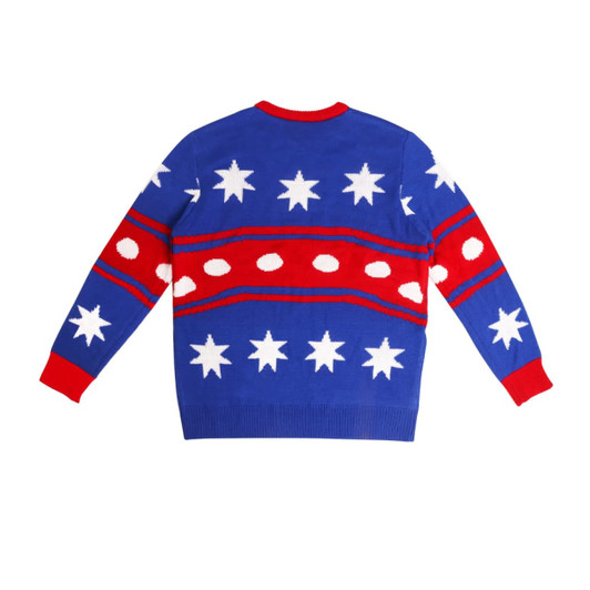 A unisex winter acrylic jacquard sweater in blue with red and white star and dot patterns on the back.