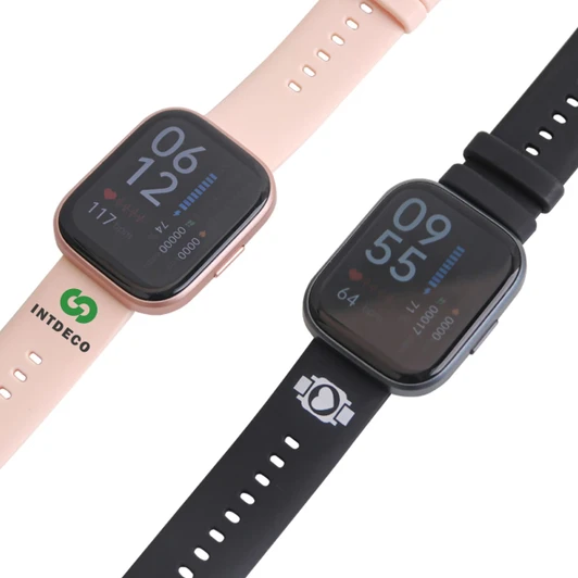 A square smart watch in pink and black with a digital display and a logo on the pink band.