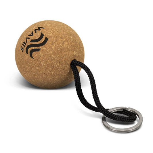 A round cork key ring with a black cord attached and a metal keyring, featuring a logo on the surface.
