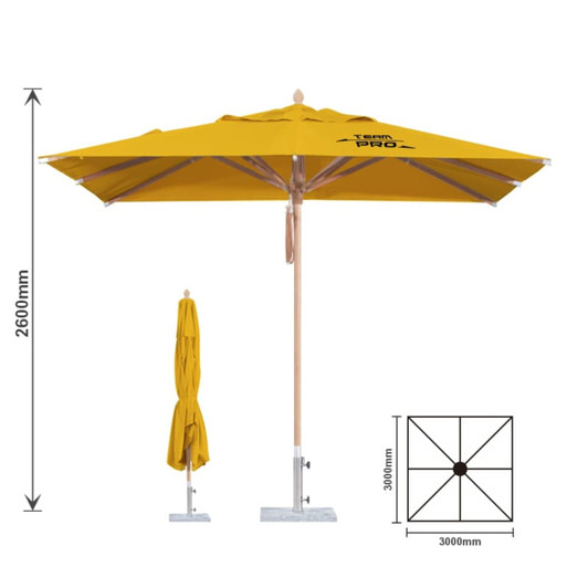 A yellow, wind-resistant outdoor umbrella with a wooden pole and a base, featuring a logo.