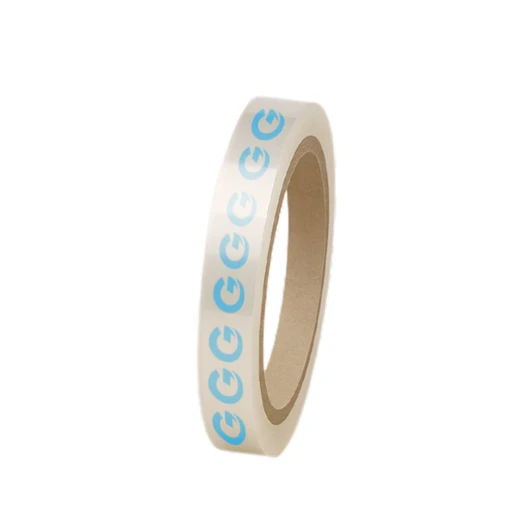 A roll of clear BOPP packing tape featuring a repeat blue logo pattern. The tape has a brown core.