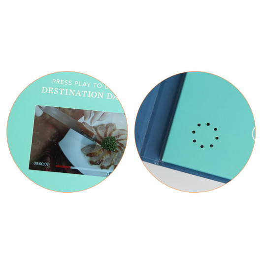 A teal 4.3-inch LCD video brochure with a screen displaying video content and an embedded speaker.