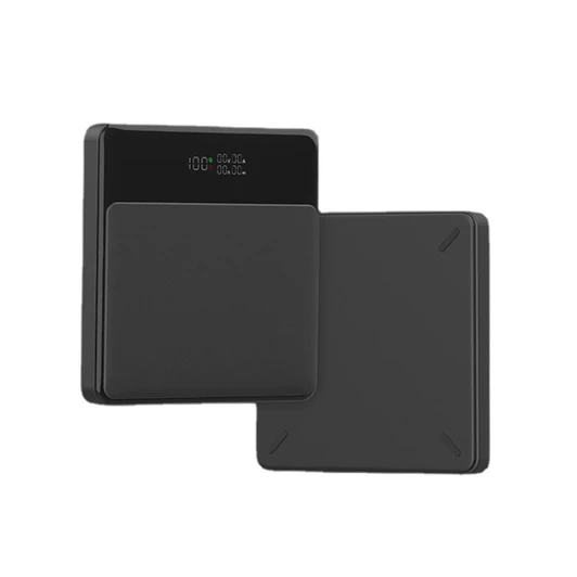 A black power bank with a textured panel, featuring a digital display on top and a smooth surface underneath.