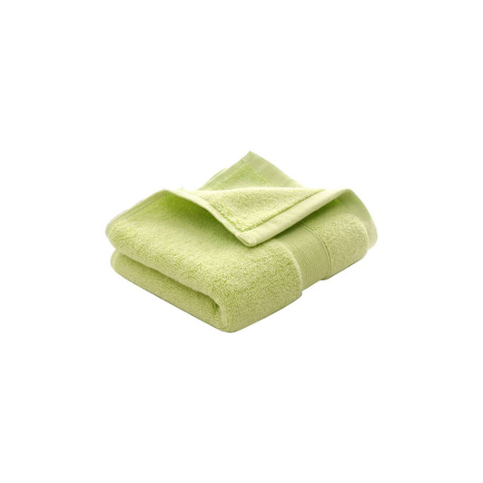 A folded embroidered cotton hand towel in a soft lime green shade, featuring a textured finish and a logo.