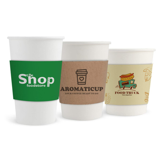 Three white paper cups displayed with different sleeve designs: green, brown, and a graphic featuring food truck elements.