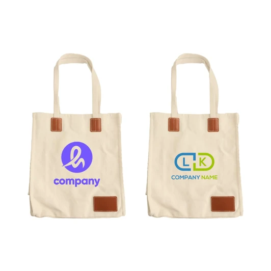 A canvas bag in beige with tan leather accents and two different logos on each side.